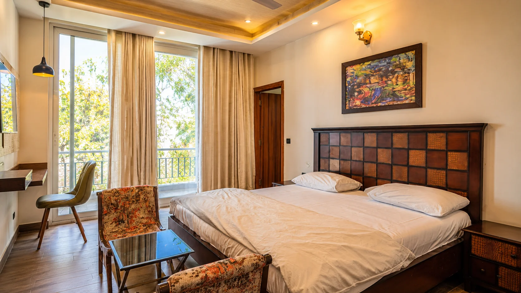 Luxury bedroom suite with high-density mattress at the best homestay in Dehradun