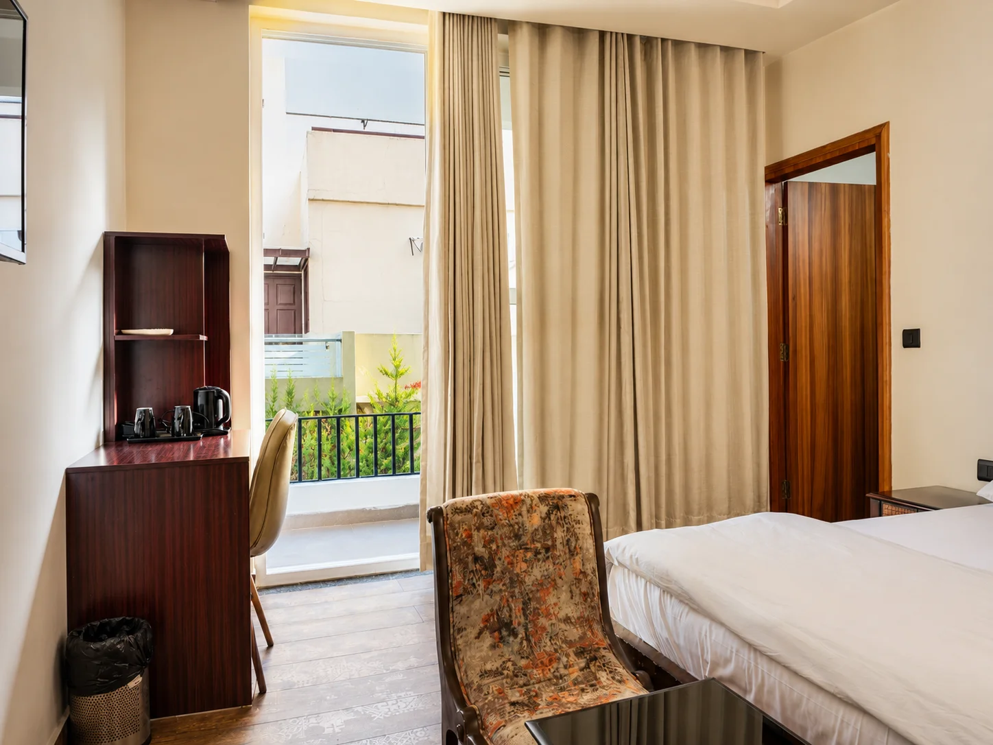 Comfortable cozy bedding and modern lights in our premium Dehradun homestay