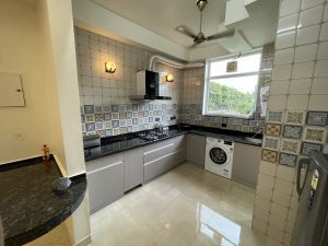 kitchen inside the palatial homes which is best homestay in dehradun